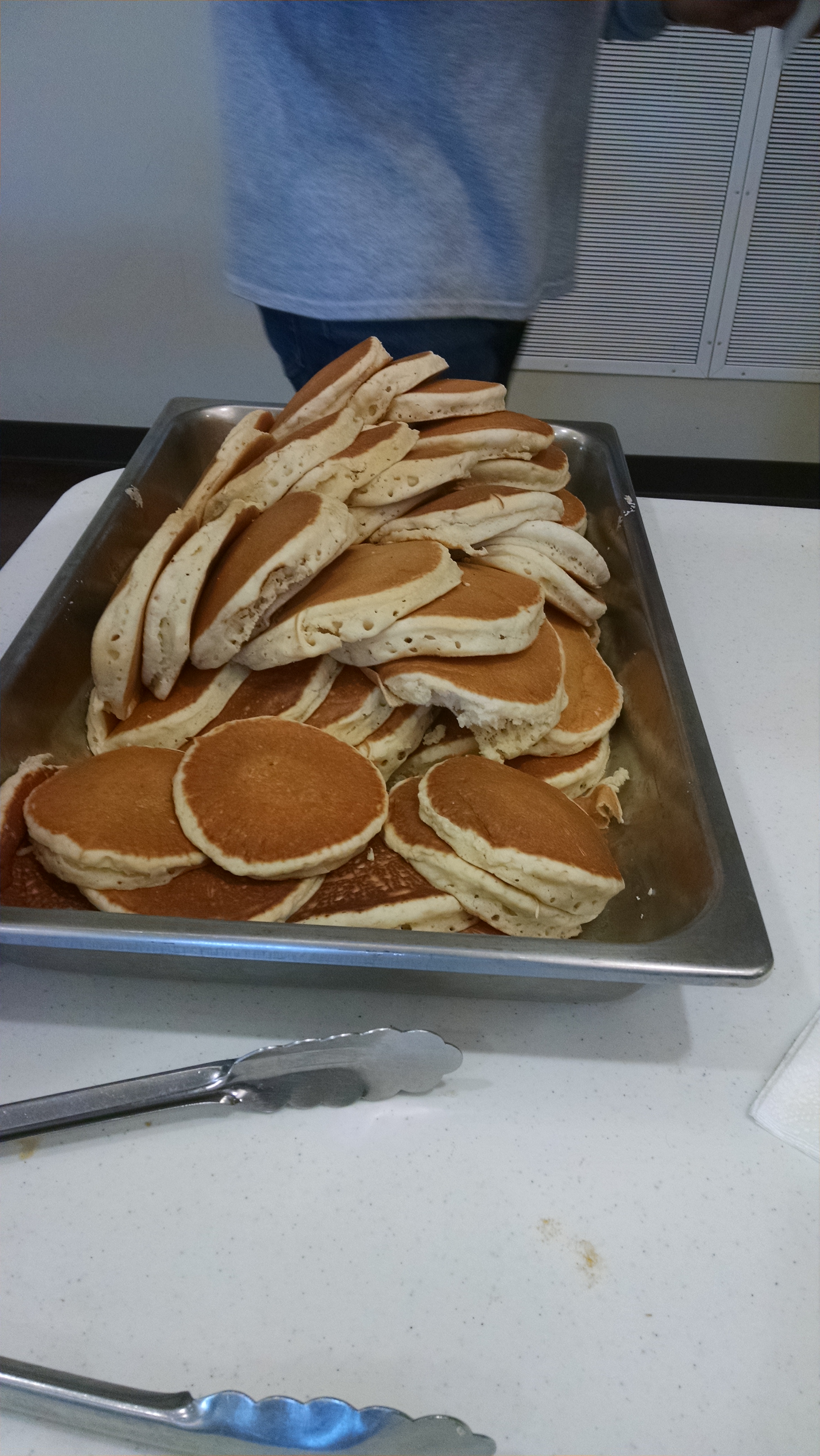 A large pile of pancakes.