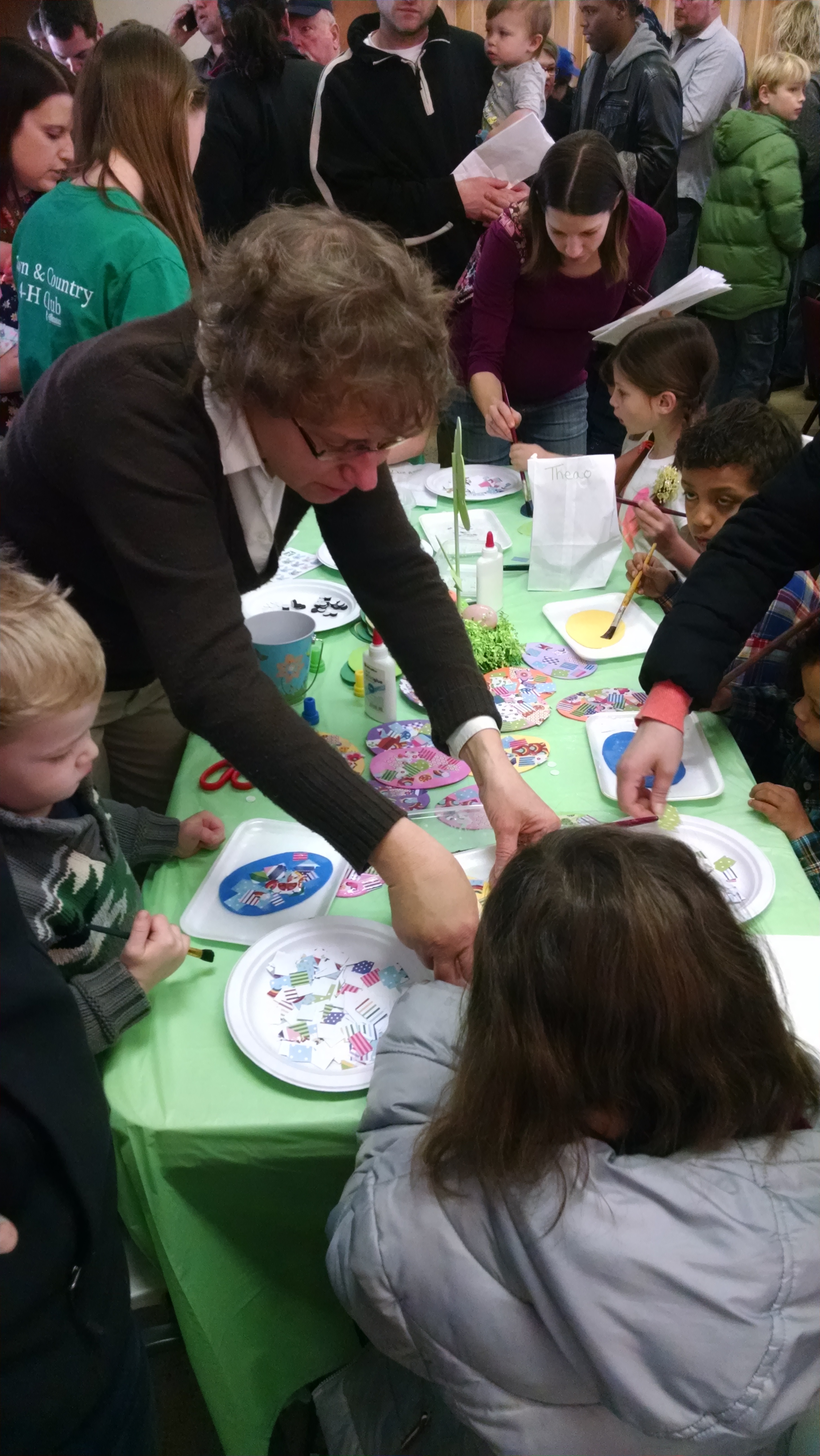 People making crafts at the event.