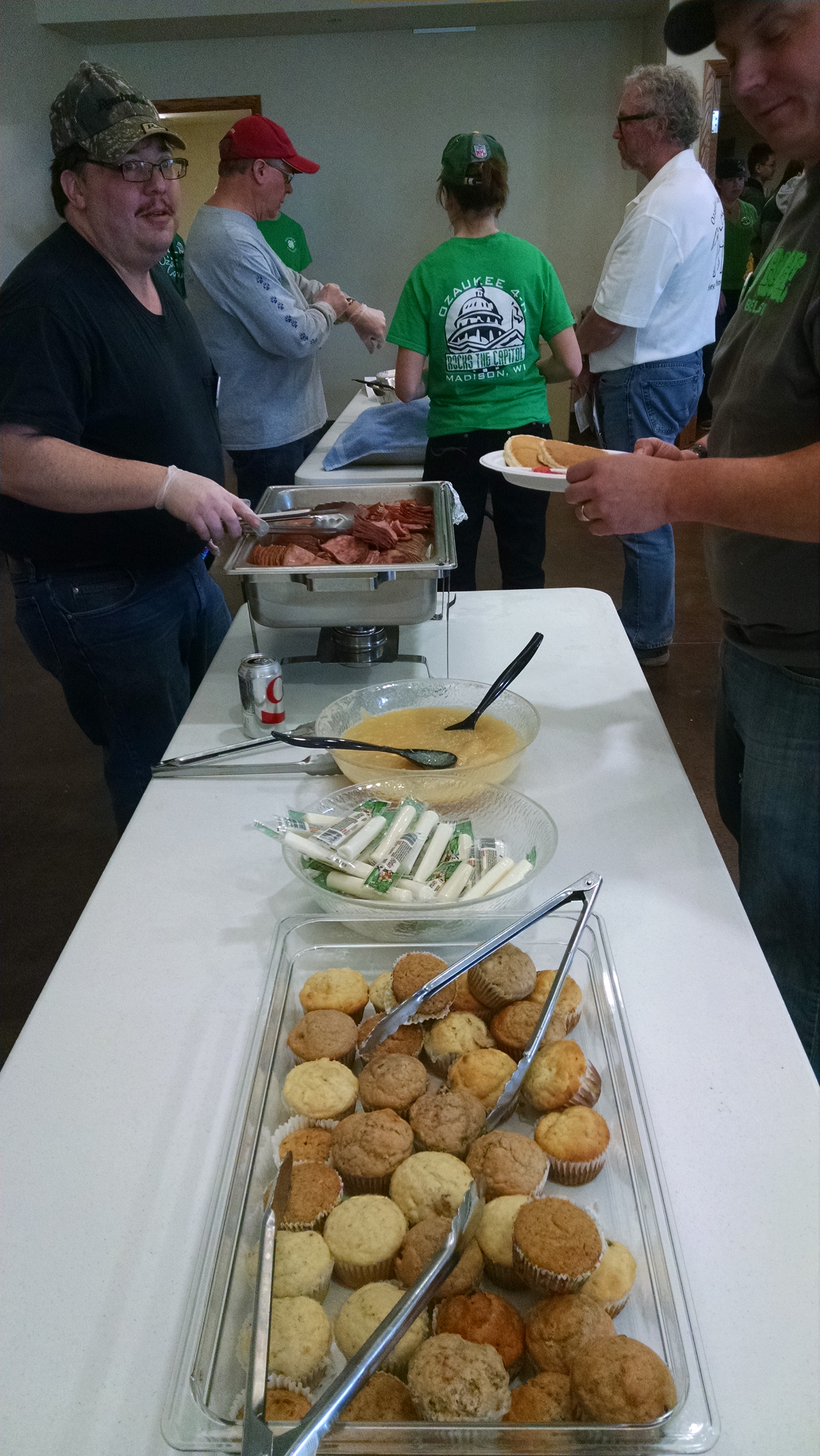 A buffet table of food.