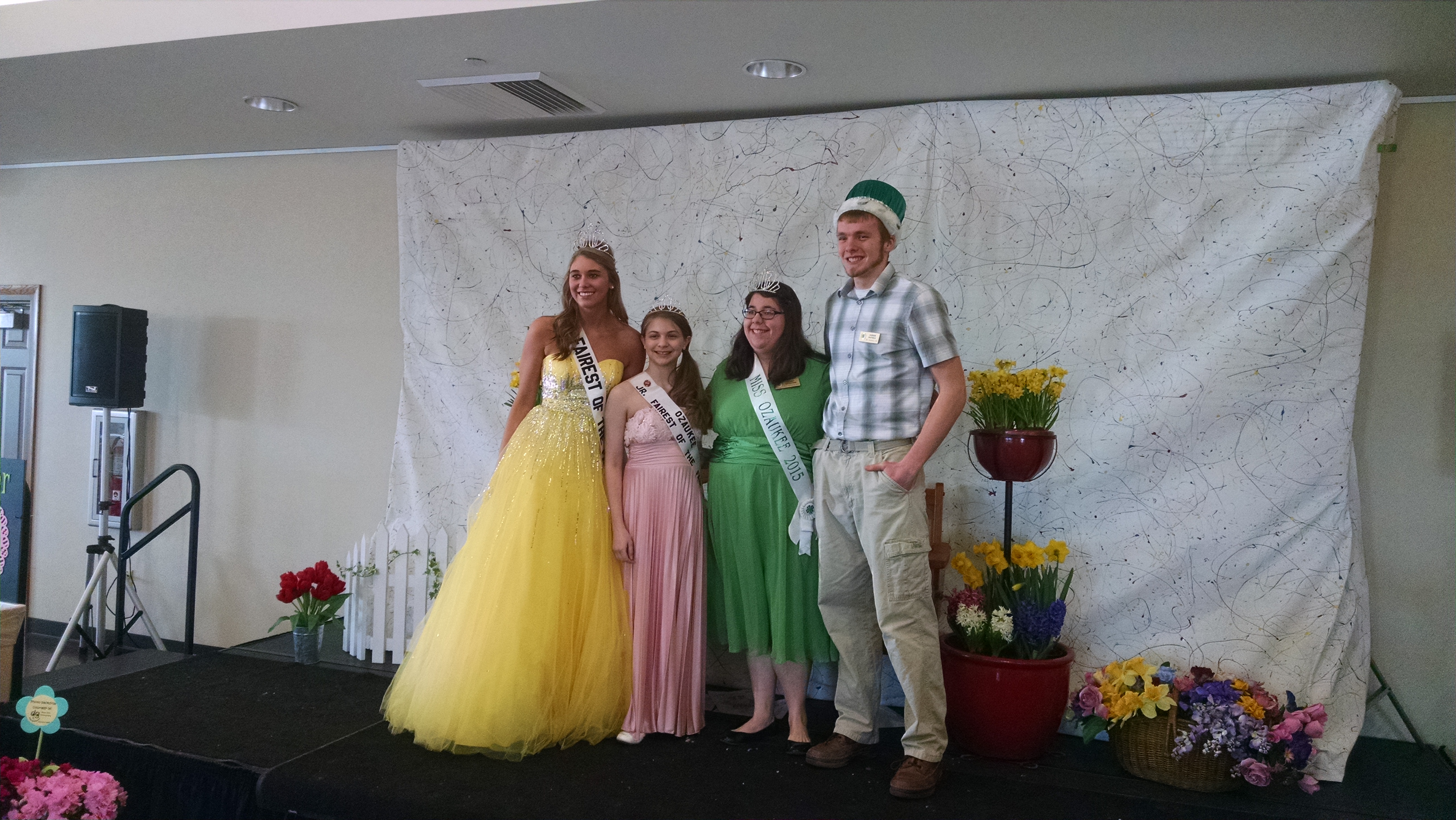 Fairest of the fair posing with the Junior Fairest of the Fair and Mr. and Ms. Ozaukee 4-H.